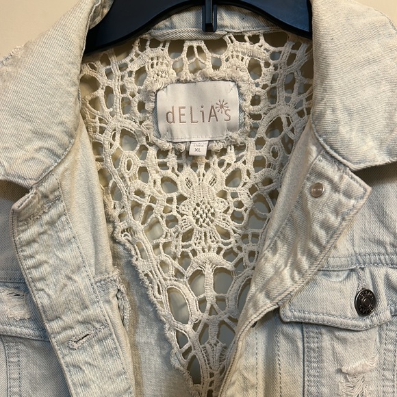 Size XL Delia’s sleeveless distressed light wash denim jacket. - Picture 2 of 4